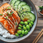 Delicious salmon rice bowl with avocado, cucumber, and edamame.